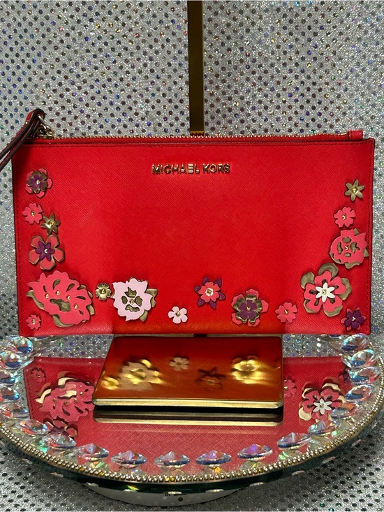 Michael Kors Handbags - Michael Kors Reddish Orange Floral Appliqué Saffiano Wristlet Approx. 10 x 6
